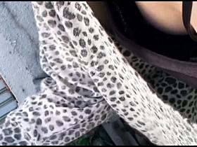 Downblouse black bra look see of an asian girl's hooters