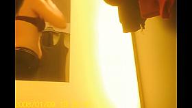 Cute spy cam girl looking so nice in her black bra