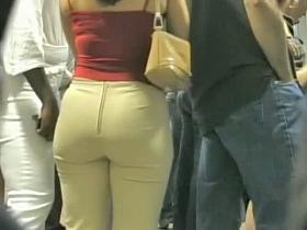 Dark haired woman wearing a yeast-inducing super tight body suit