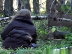 Two women take a pee outdoors in public