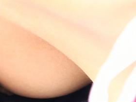 Skinny Asian girl gives a downblouse peek in the spy cam