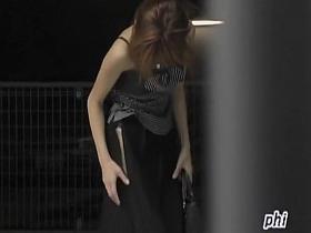 Sharking of a stunning slender girl on streets of Japan
