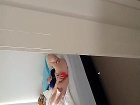 Sneaking up to spy on sister with a dildo