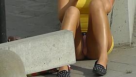 Cigarette glasses pants beneath her petticoat