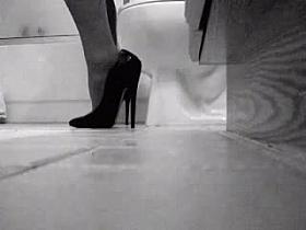 Bitch in a bathroom trying out a vibrator