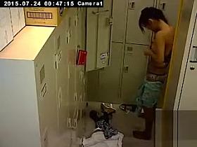 Cute Asian girl changes in the locker room