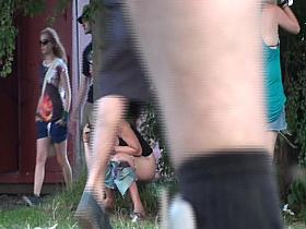 Milf in sunglasses pissing in public on the voyeur cam