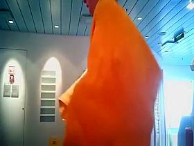 Woman drying and other dressing swimsuit