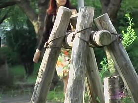 Tantalizing long-legged oriental woman flashes her thong during sharking scene