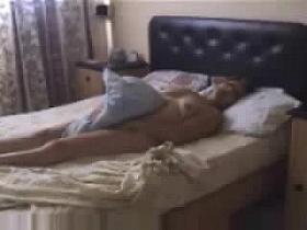 Hidden cam caught my mom masturbating on bed