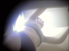 Small titted girl with hairy nub on changing room spy camera