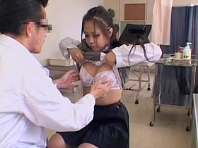 Short Jap babe reveals her jugs and slit during pussy exam