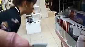 Swinging the cock around her head