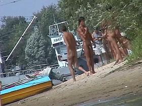 Beautiful chicks playing at the beach while I film the