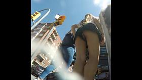 Beauty with shorts upskirted on the street.