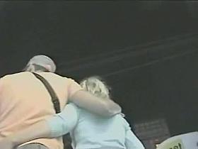 Bimbo in short jeans skirt shows her white thong and ass